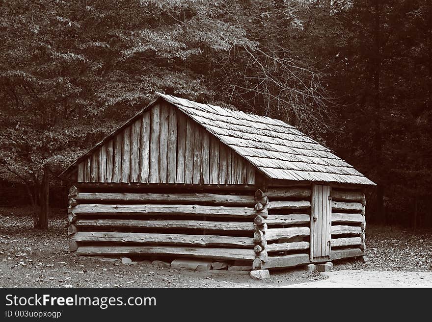 A log cabin at Cades Cove in the Smoky Mountains. A log cabin at Cades Cove in the Smoky Mountains