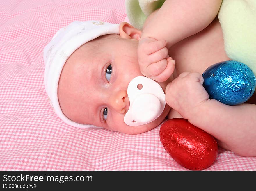 Young baby on first easter hunt. Young baby on first easter hunt