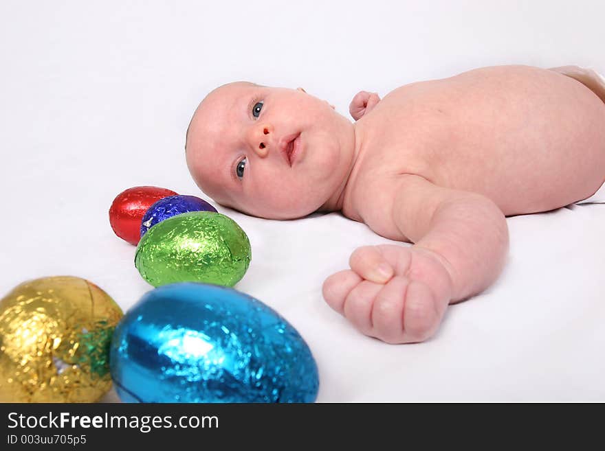 Young baby on first easter hunt. Young baby on first easter hunt