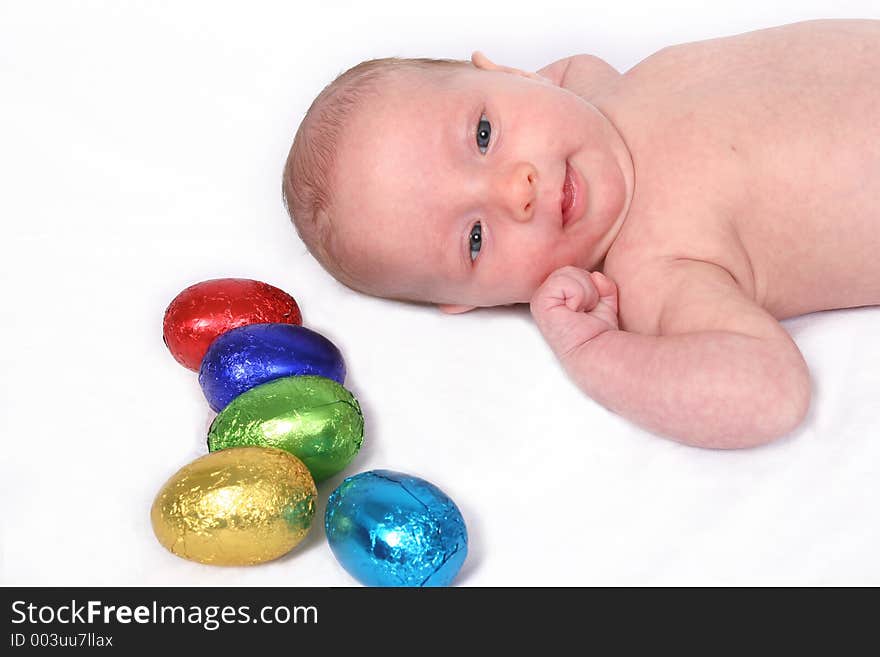 Young baby on first easter hunt. Young baby on first easter hunt