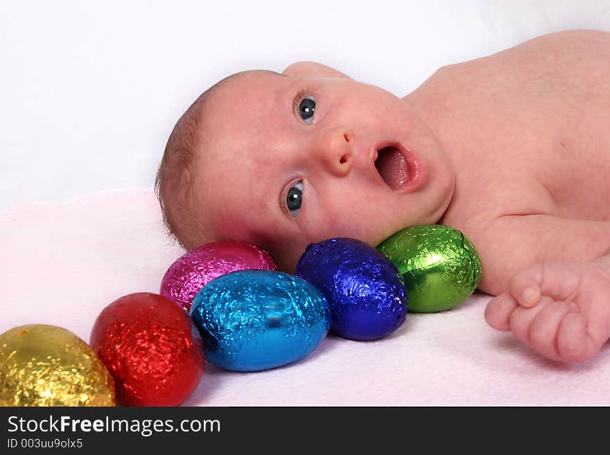 Young baby on first easter hunt. Young baby on first easter hunt