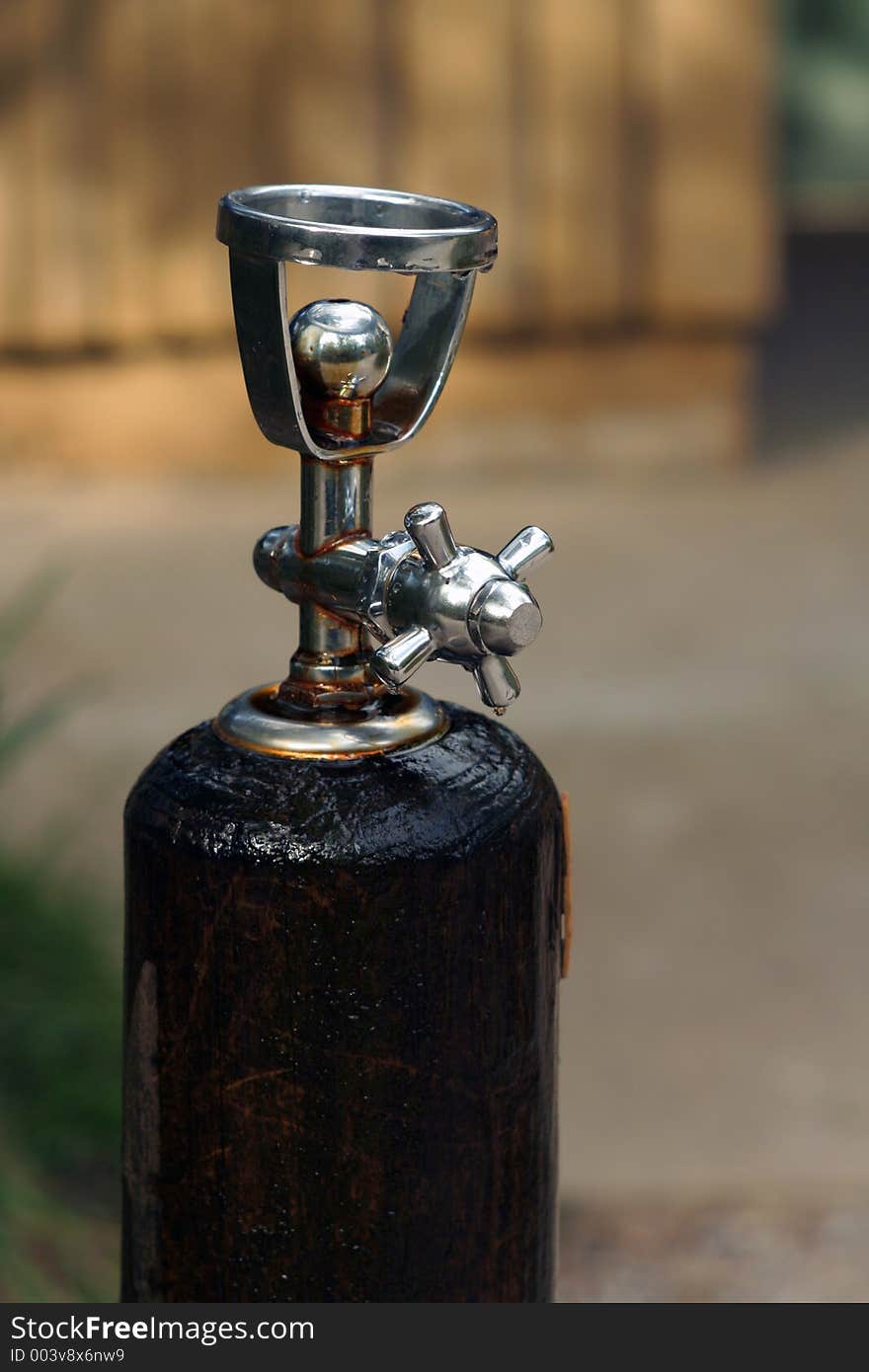 Dripping water fountain in a camp ground.