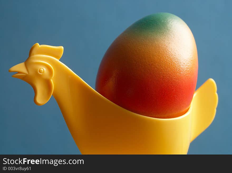 One chicken- eggcup wiht a coloured egg -. One chicken- eggcup wiht a coloured egg -