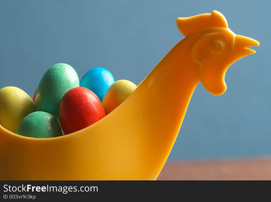 Yellow plastic- chicken with little choco eggs in it. Yellow plastic- chicken with little choco eggs in it