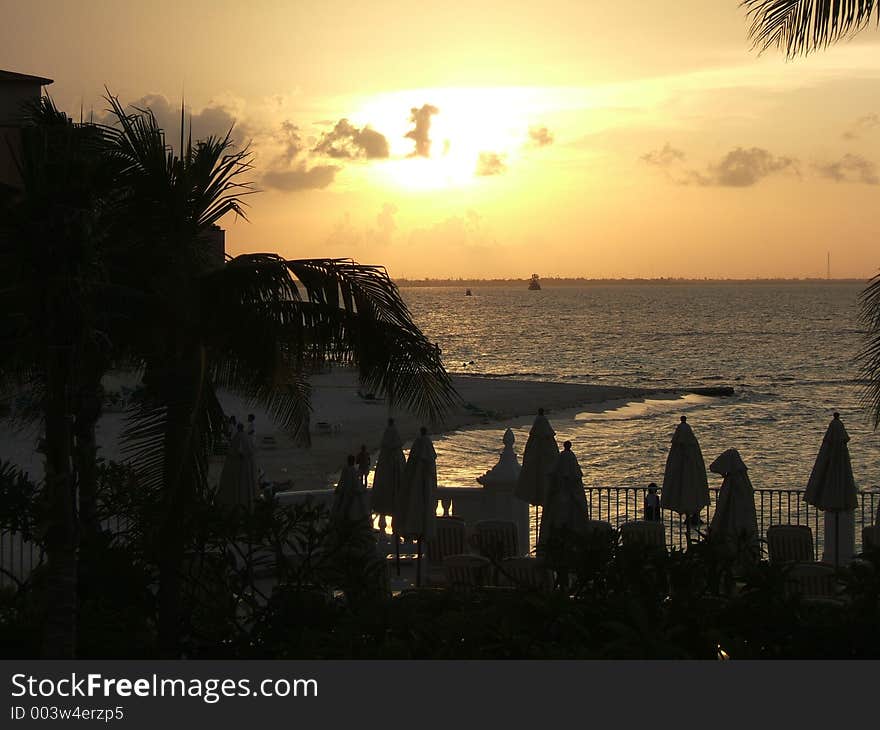 Sunset in Cancun, Mexico at a beach-side resort. Sunset in Cancun, Mexico at a beach-side resort