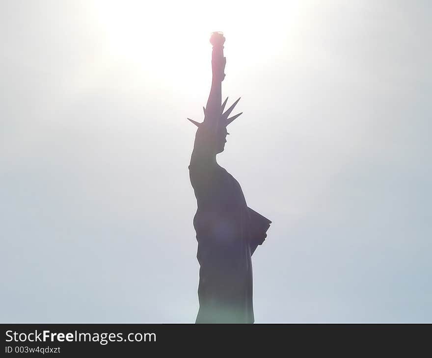 Liberty statue in blazing sun