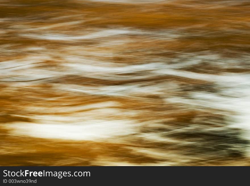 A panning abstract of a sunset reflected in an office window. A panning abstract of a sunset reflected in an office window.