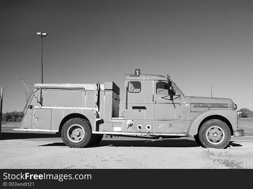 An antique fire truck. An antique fire truck