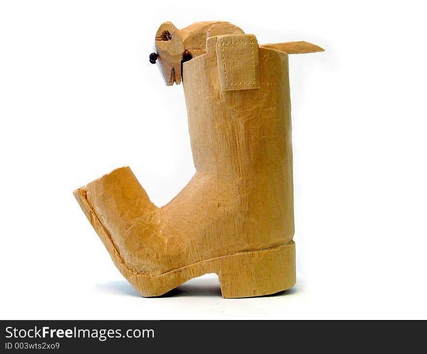 Carving of a wooden boot and mouse. Carving of a wooden boot and mouse.