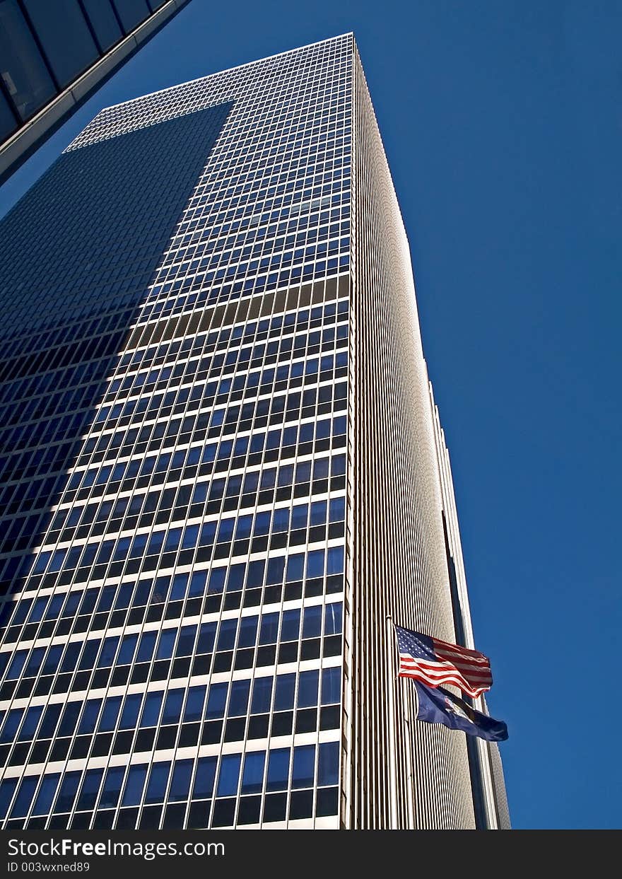 This is a shot of a tall office building in Manhattan. This is a shot of a tall office building in Manhattan.