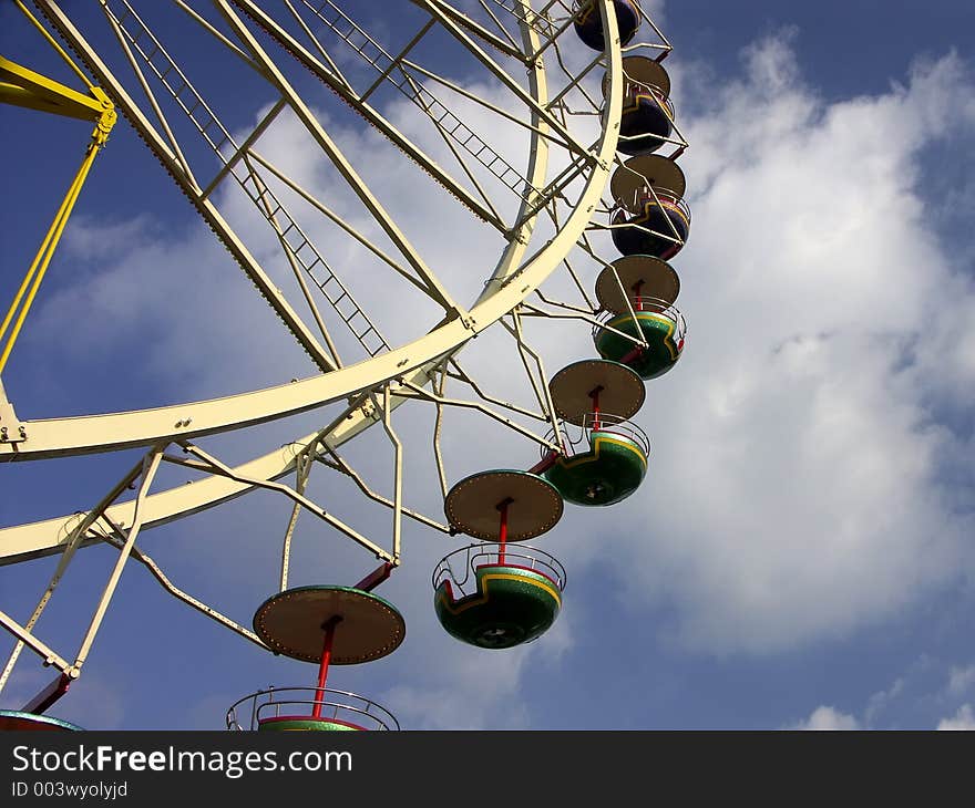 Ferris wheel from below. Ferris wheel from below