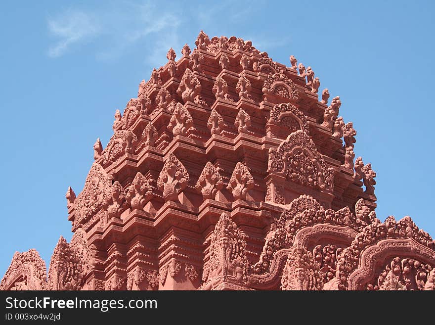 A dome littered with 5 headed cobras on a temple in Cambodia.