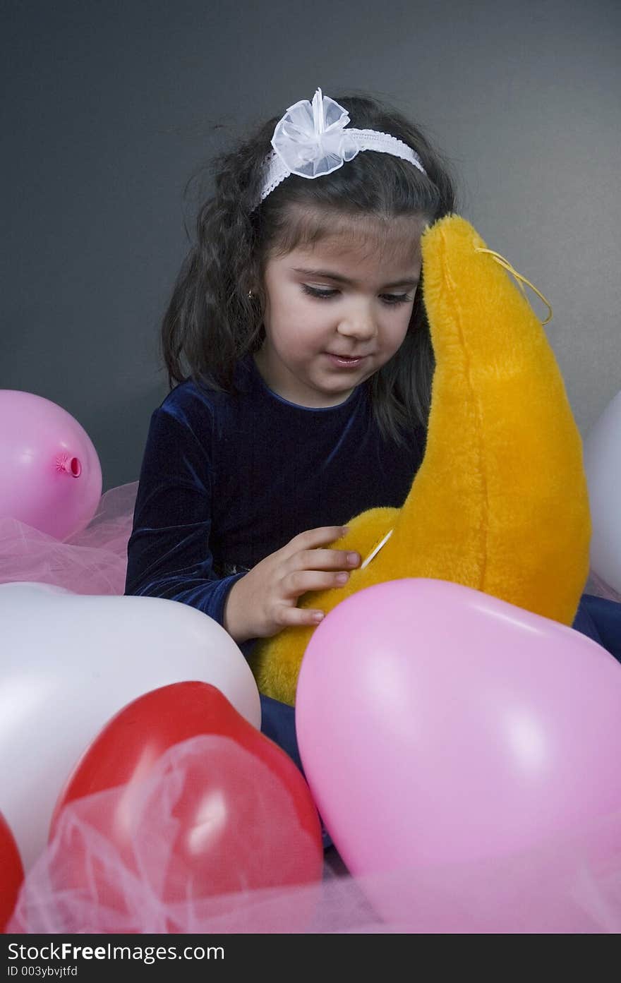 Sweet Young Girl Playing With Her Plush Moon