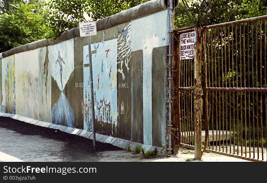 A part of the Berlin Wall with graffiti. It is a listed monument.