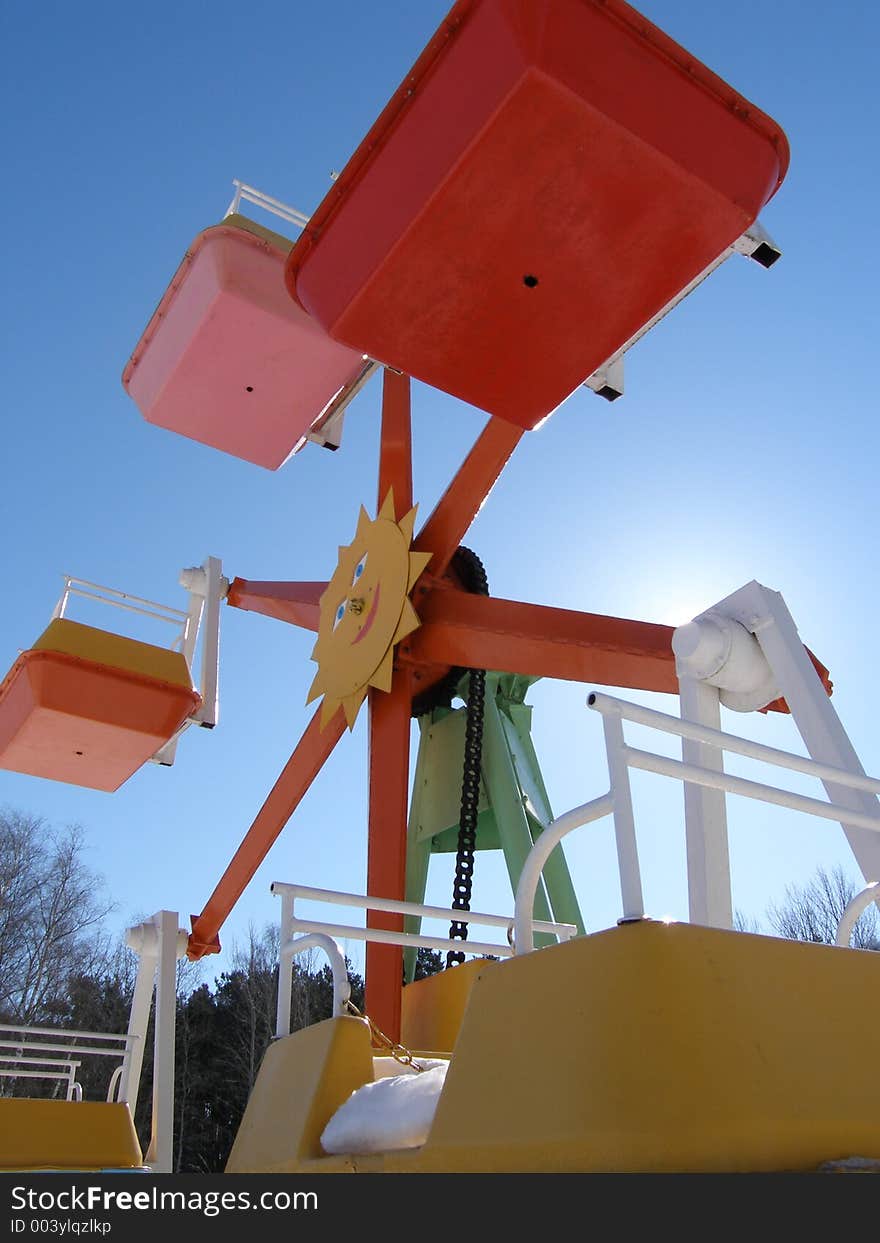 Children ferris wheel in winter