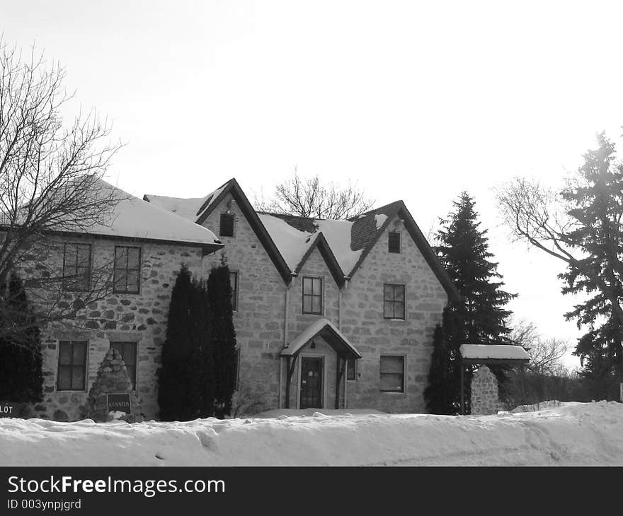 This image depicts an old stone mansion.