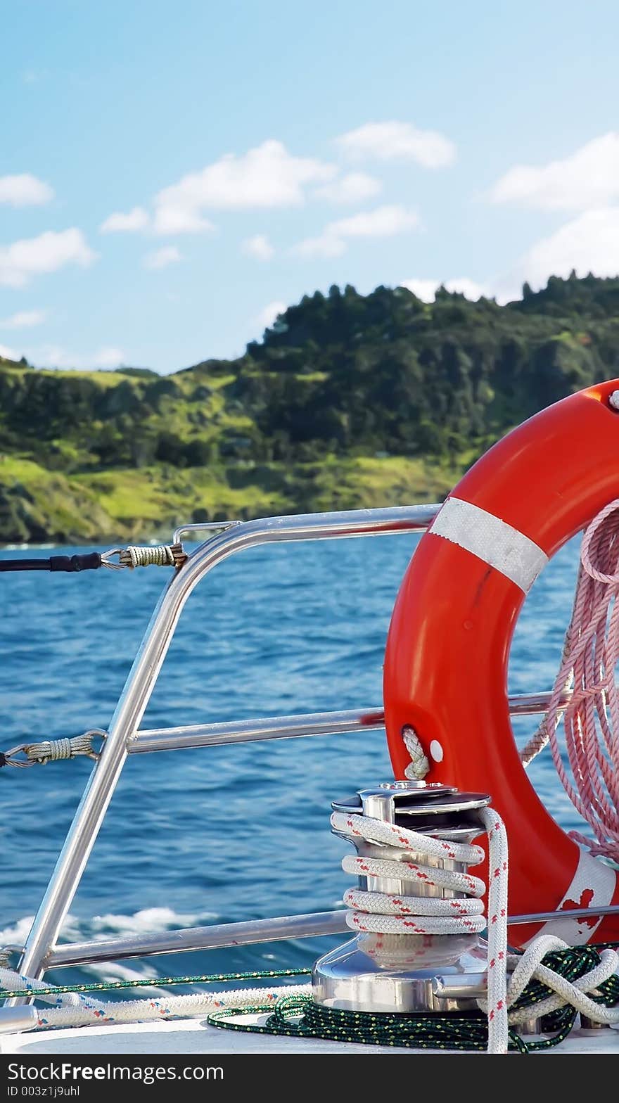 Beautiful sailing near some landscapes.