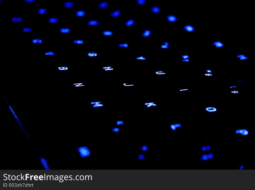 Blue neon Keyboard in a dark area