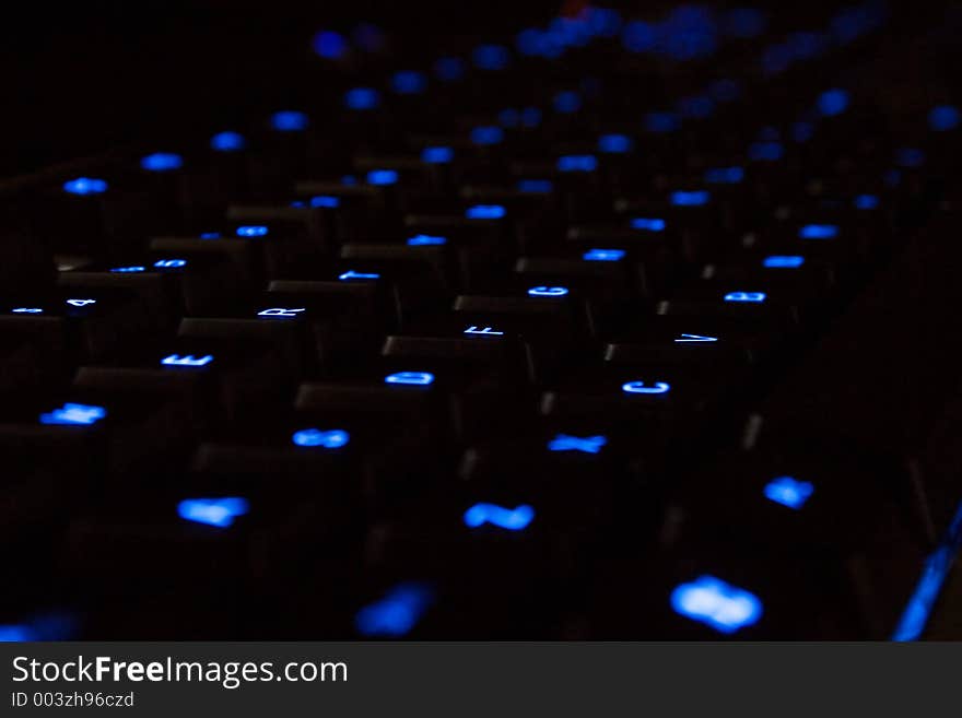 Blue neon Keyboard in a dark area