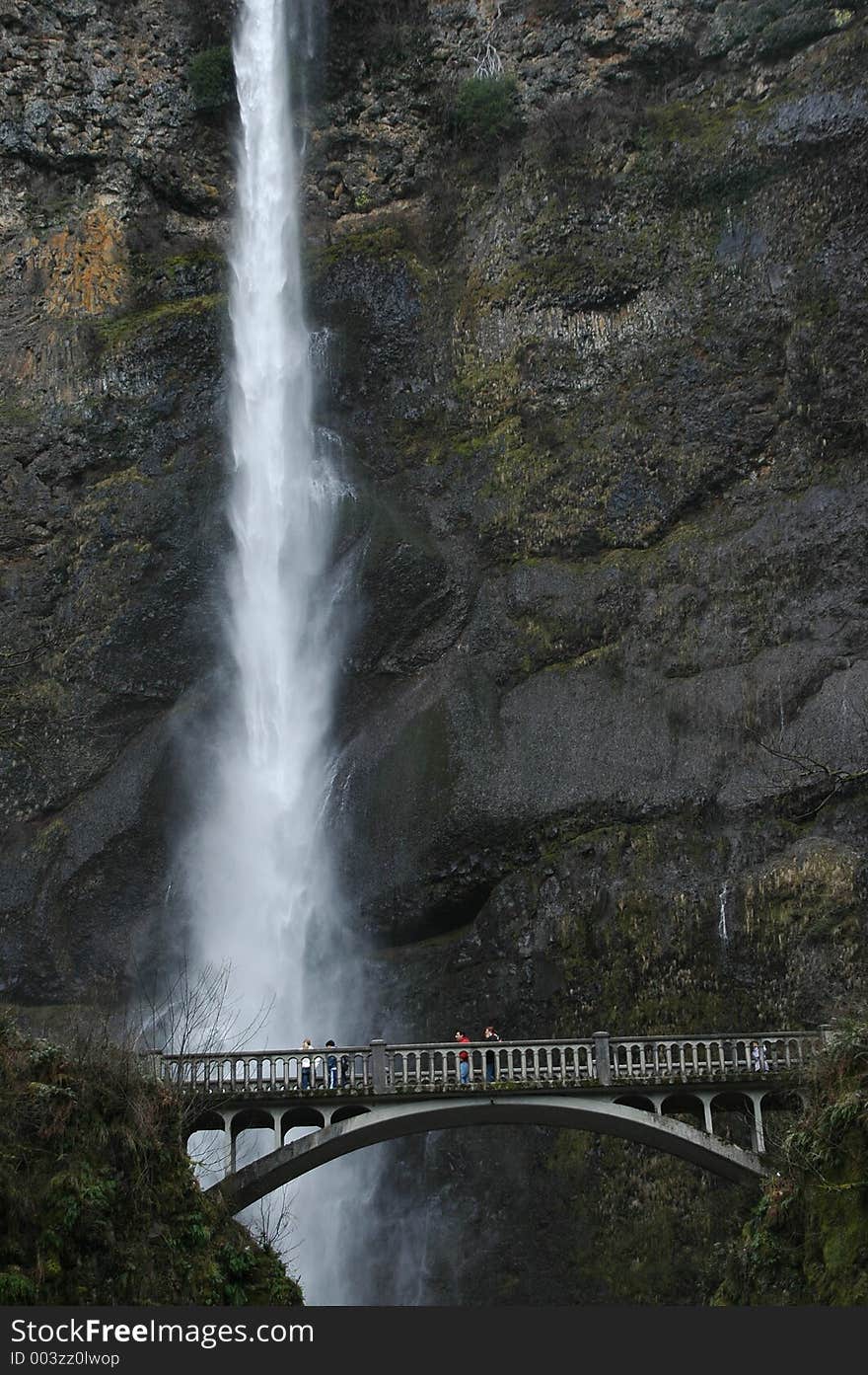 Waterfall under bridge