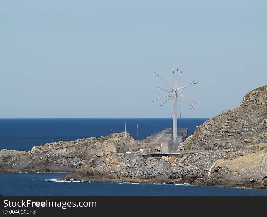 Windmill farm by the Ocean