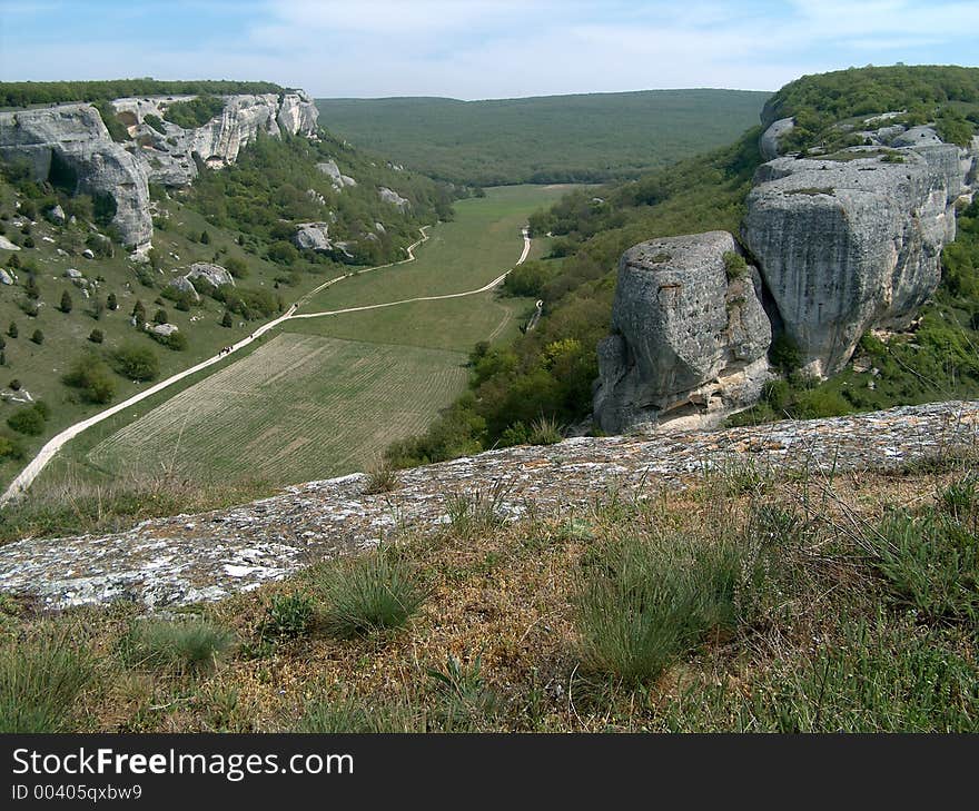 Summer landscape with road and people