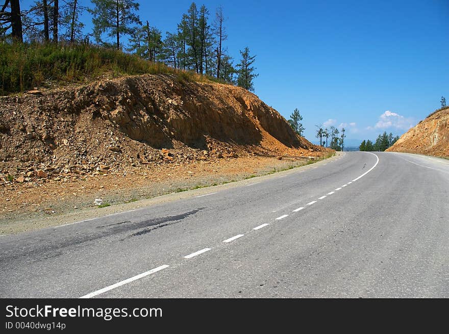 Road, mountains and skies. Altay