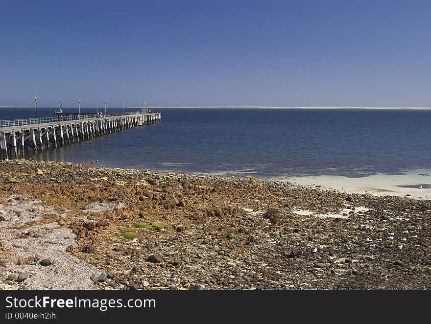 The Port Victoria jetty and beach, South Australia. The Port Victoria jetty and beach, South Australia.