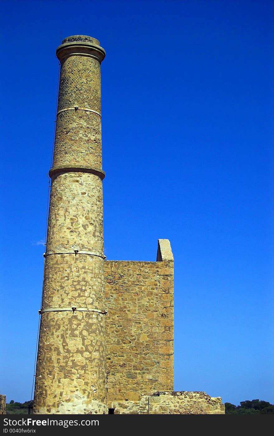 The dominating chimney of the Hughes engine house at Moonta Mines, South Australia. The dominating chimney of the Hughes engine house at Moonta Mines, South Australia.