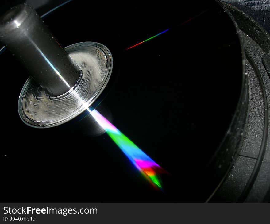 Close up of a cd stack with a rainbow shine. Close up of a cd stack with a rainbow shine