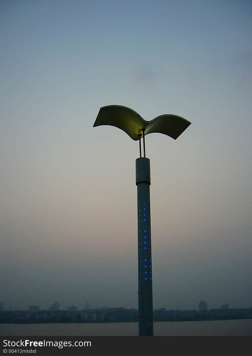 Aritistic lamppost at dusk sky