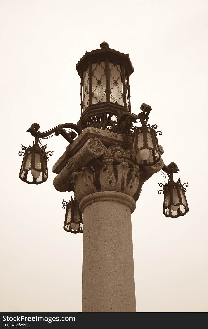 Old street lamp in shot in sepia tone