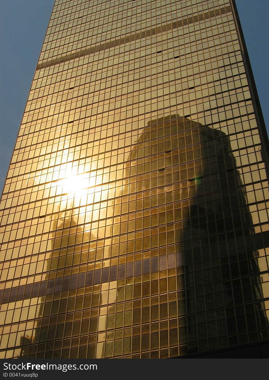 Modern building in copper reflective glass. Modern building in copper reflective glass