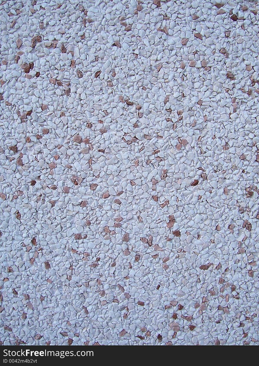 Small stones surface texture of a wall