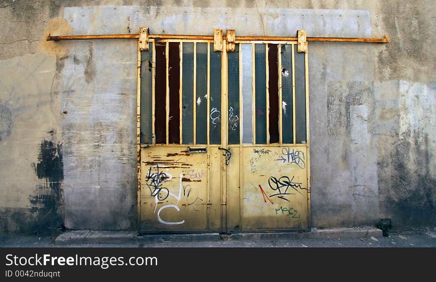 An old locked door on a building in marseille, france