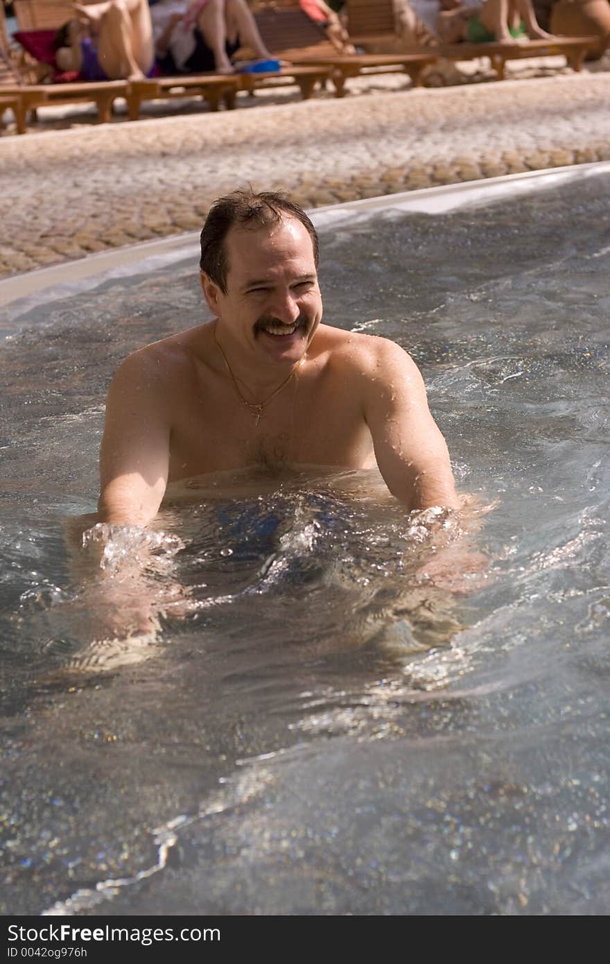 Man in jacuzzi. Man in jacuzzi