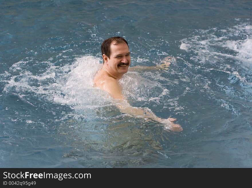 Man in jacuzzi. Man in jacuzzi