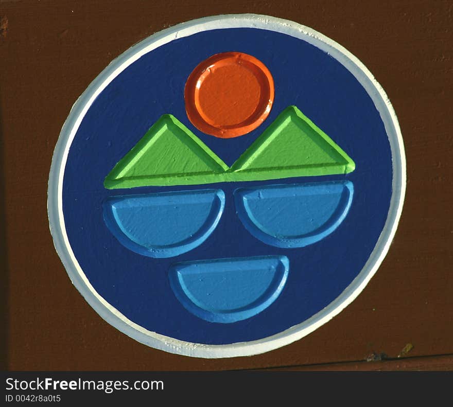 Park sign depicting sun, earth and water reference. Park sign depicting sun, earth and water reference