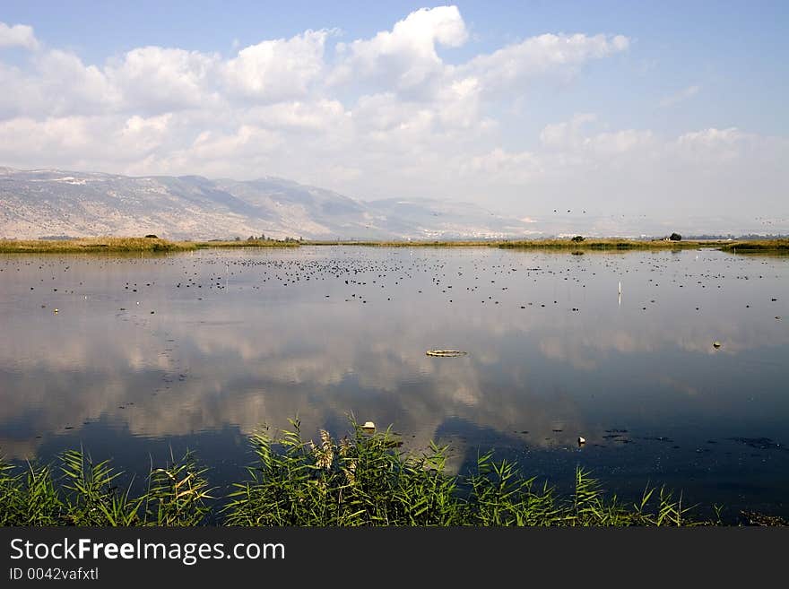 Mountain reflection in the water of the lake