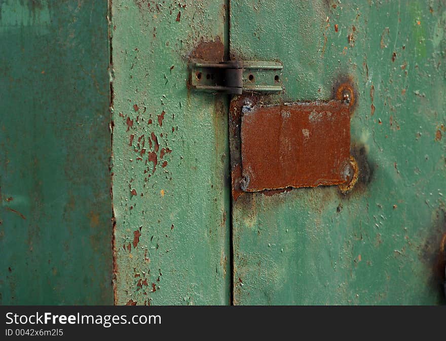 The image of an old iron wall. The image of an old iron wall