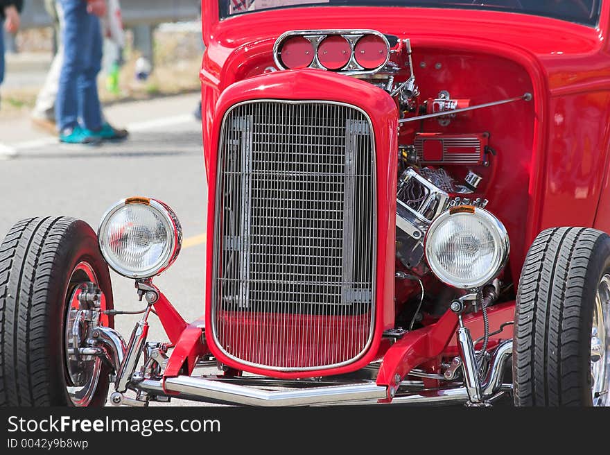 Street rod in parade going through town. Street rod in parade going through town