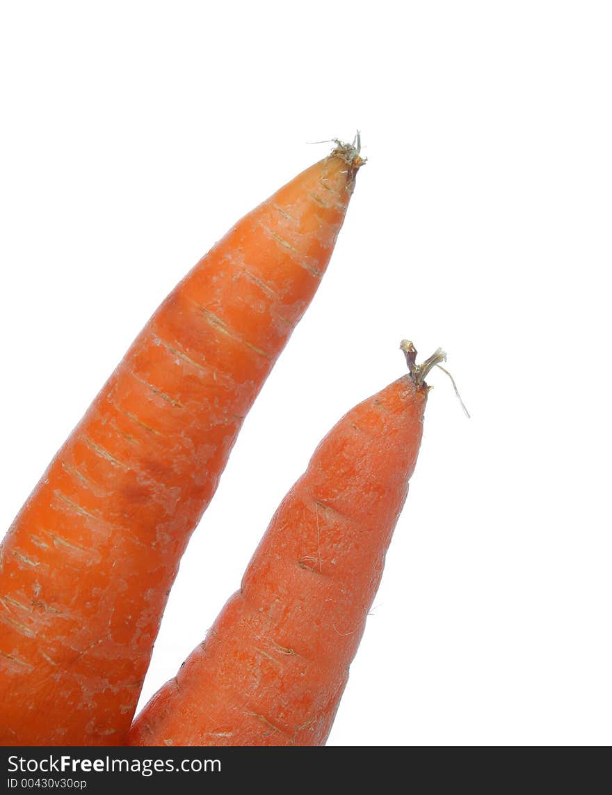 Detail of two carrots ends over white background. Look at my gallery for more fresh fruits and vegetables.