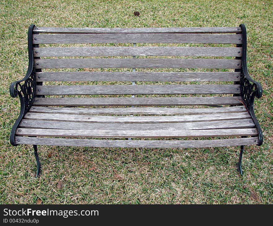 Garden chair in the middle of grass