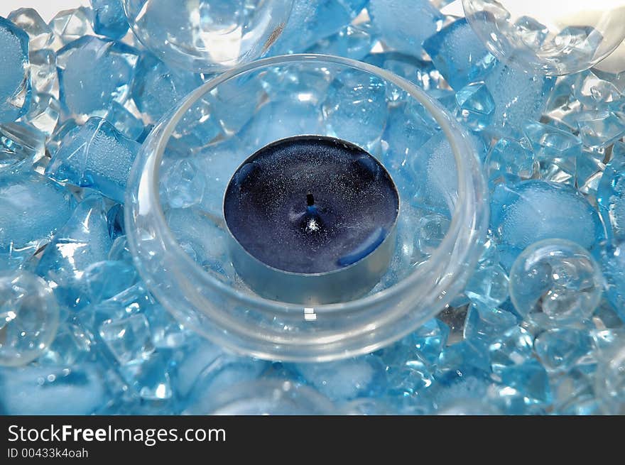 Tealight in midst of blue diamonds. Tealight in midst of blue diamonds