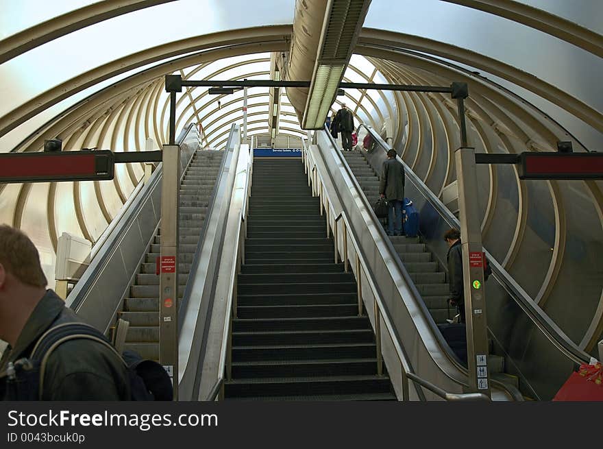 Moving staircase with people going up