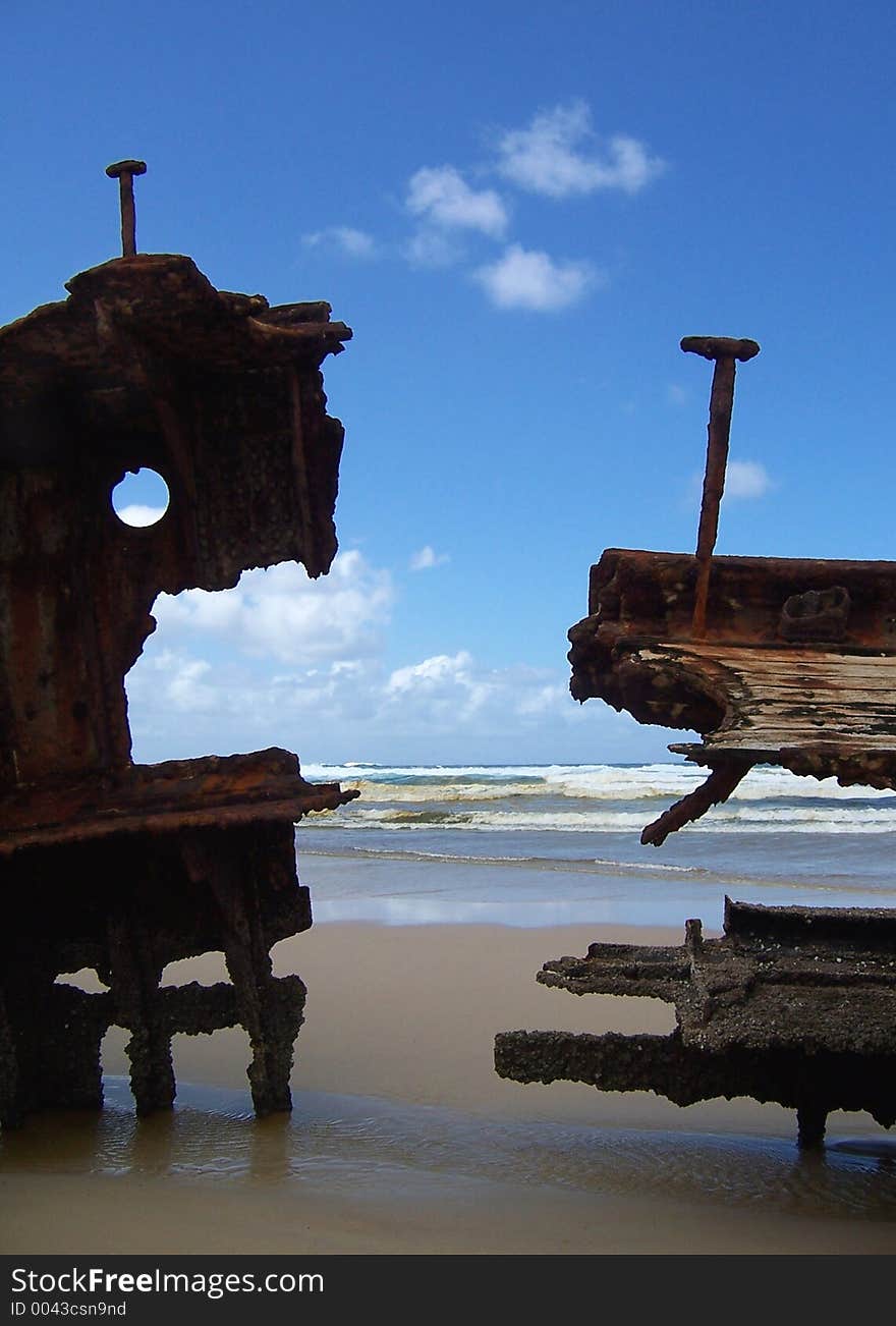 Rotting wood and metal on the beach. Rotting wood and metal on the beach