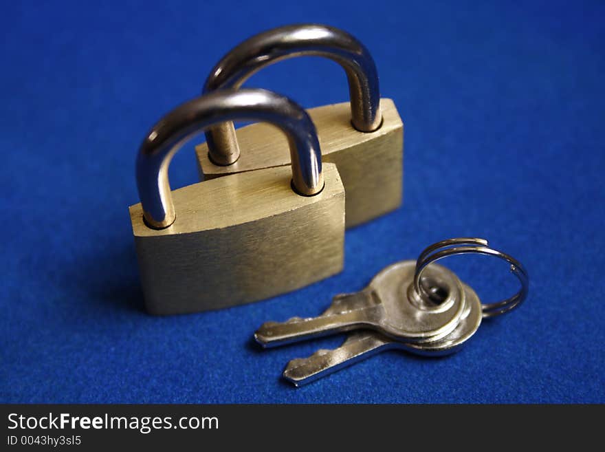 Two padlocks with keys