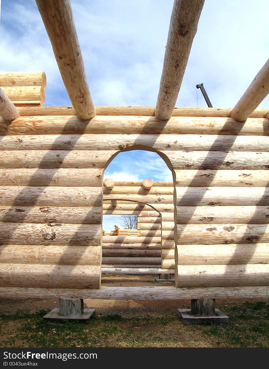 Several doorways in a log cabin under construction. Several doorways in a log cabin under construction