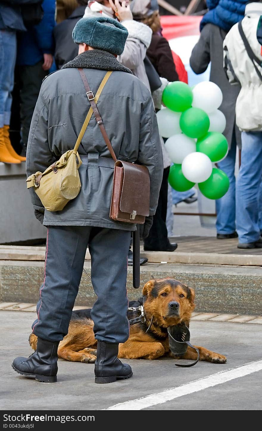 The Russian policeman and his dog on dog on a watch. The Russian policeman and his dog on dog on a watch