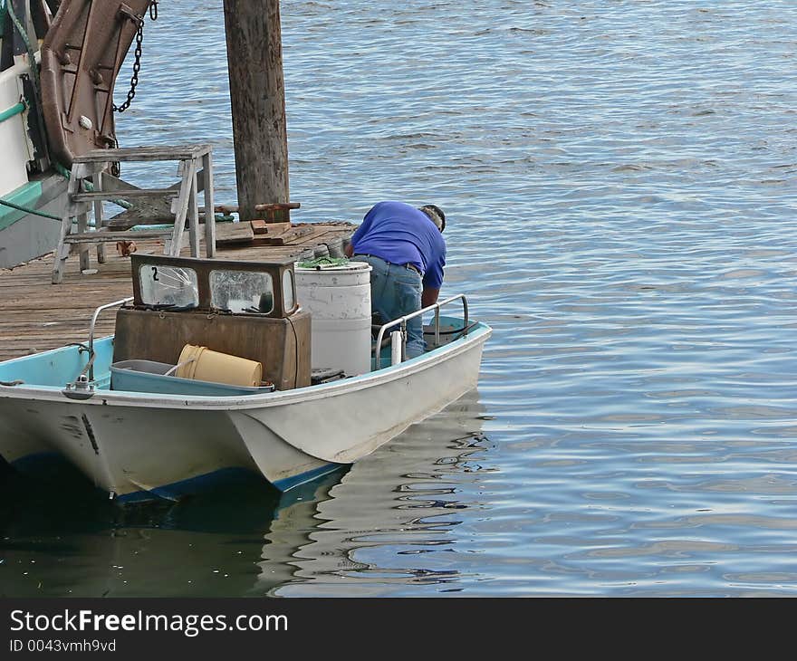 Man In A Old Boat